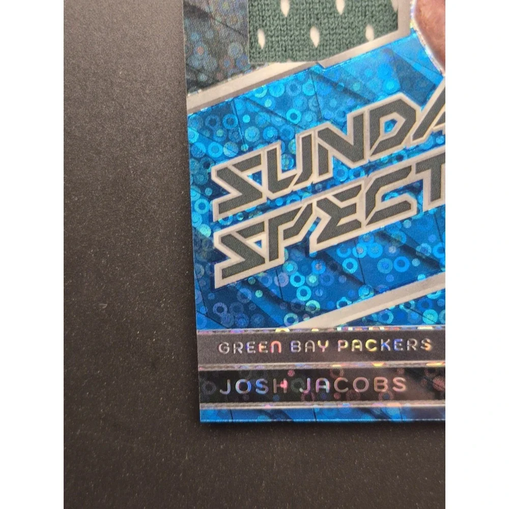 2024 Panini Spectra Sunday Spectacle Josh Jacobs #SS-JJS Neon Blue Prizm /60